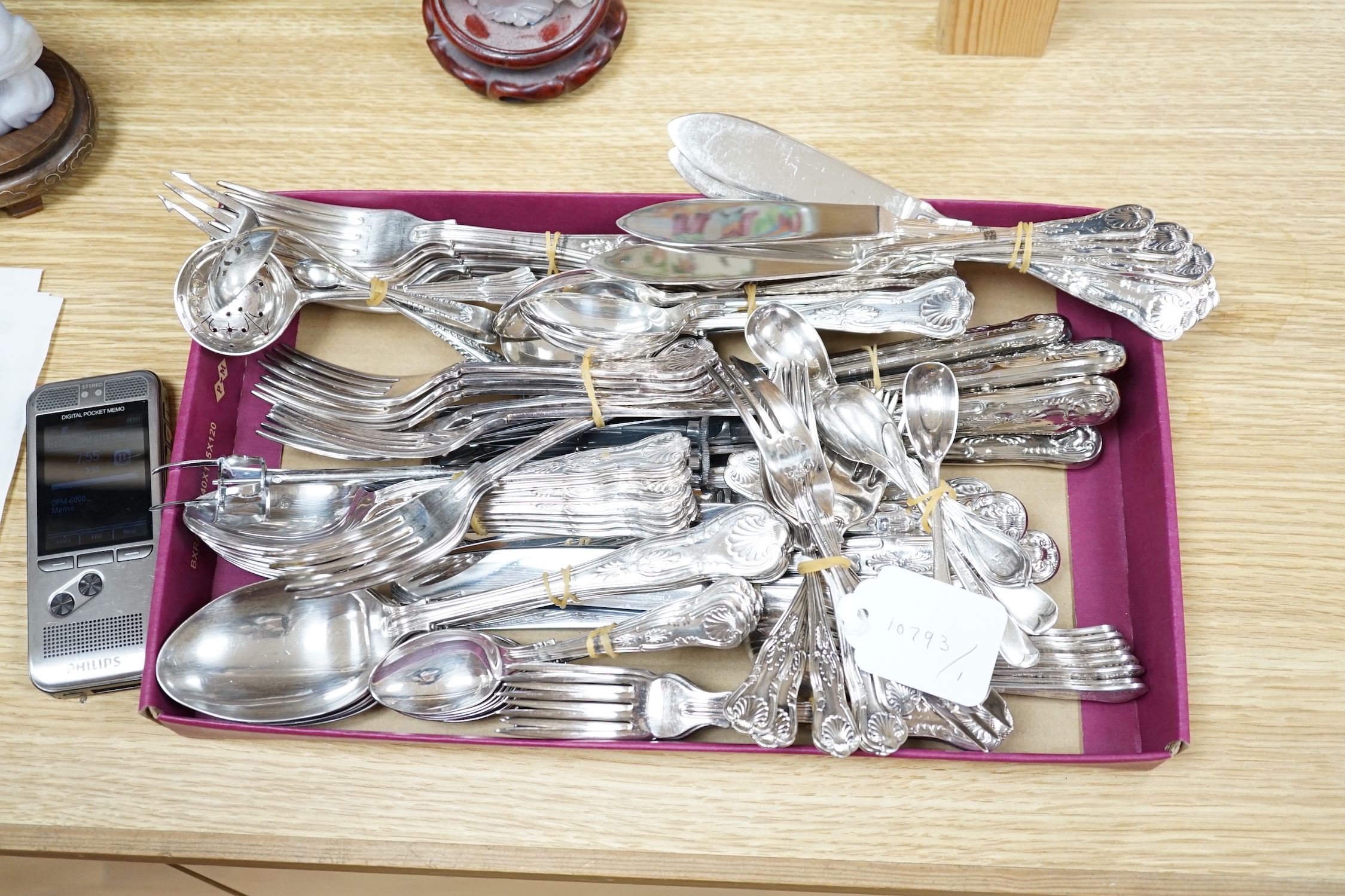 An eight place silver plated cutlery set